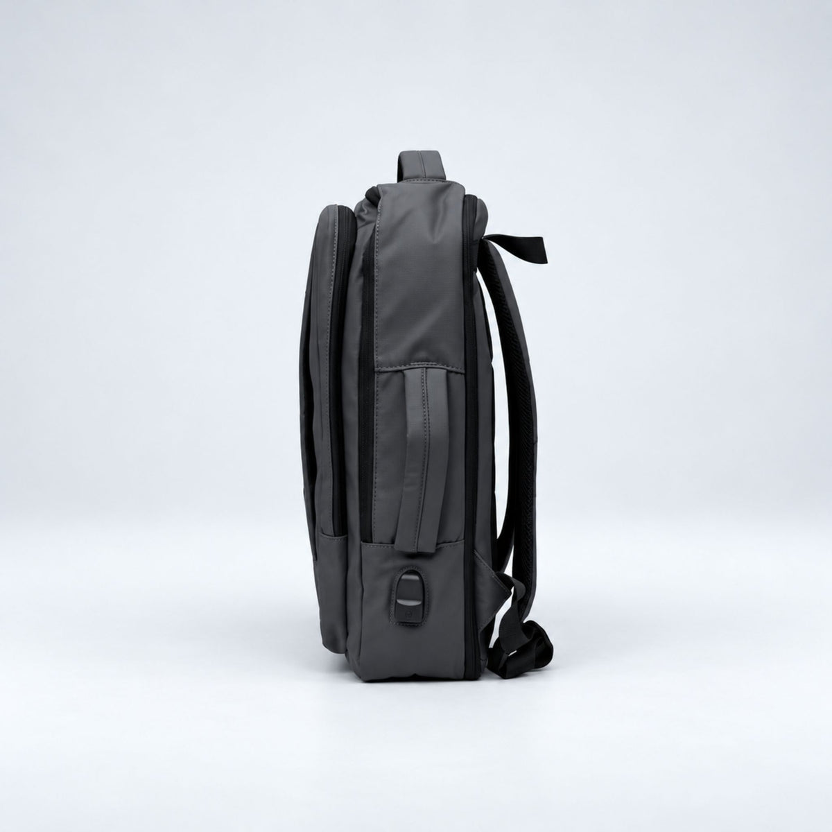 Grey Commuter laptop backpack side view with USB port #Colour_Grey